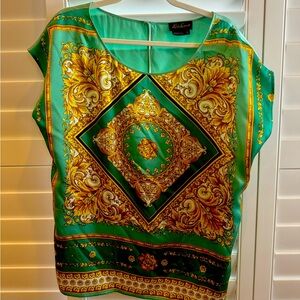 Beautiful silk top by Luisa Spagnoli. Gorgeous colors perfect for summer large